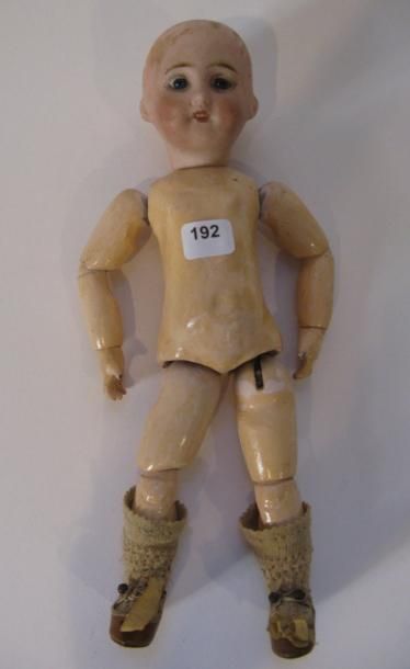 Poupée tête porcelaine Bleuette. Corps composition....