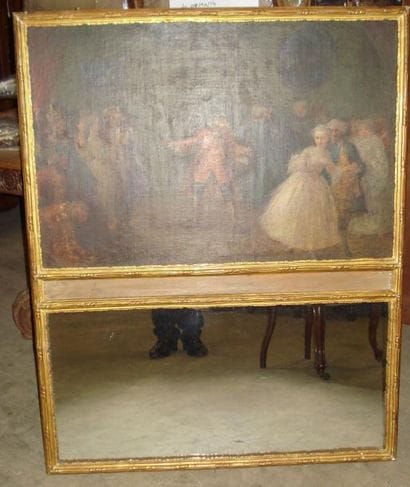 Trumeau à encadrement en bois doré. Le miroir...