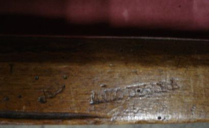 Armoire en noyer et hêtre largement moulurée....