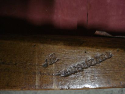 Armoire en noyer et hêtre largement moulurée....