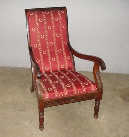 Fauteuil de repos en palissandre massif sculpté...