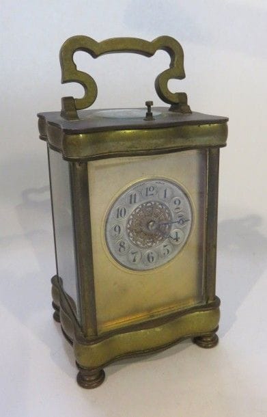Pendule réveil de voyage en bronze doré et...