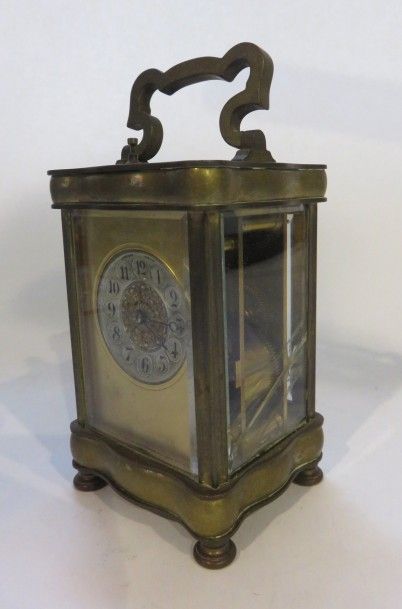 Pendule réveil de voyage en bronze doré et...