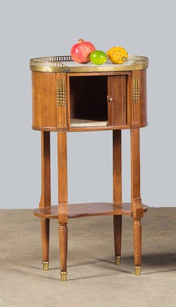 Table tambour en acajou et placage d'acajou...