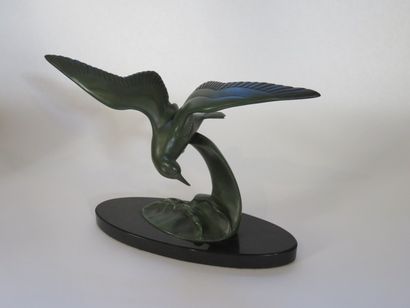 Mouette sur la vague Bronze à patine verte...