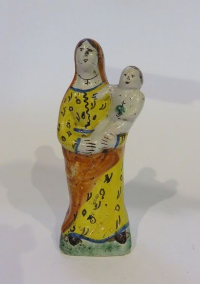 Vierge à l'Enfant en faïence polychrome,...