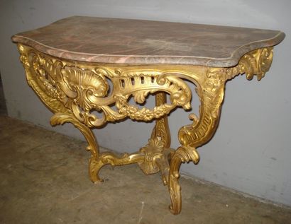 Console en bois doré mouluré et sculpté,...