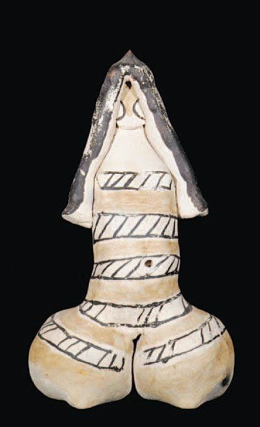 Statuette callipyge Céramique gris-beige....