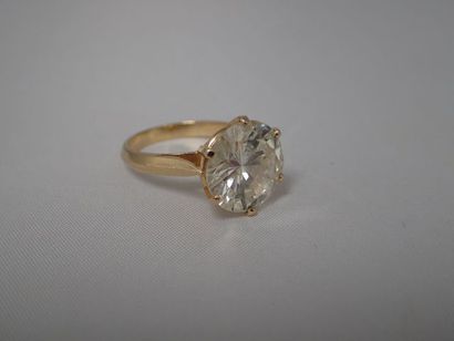 Bague solitaire en or jaune (750 millièmes)...