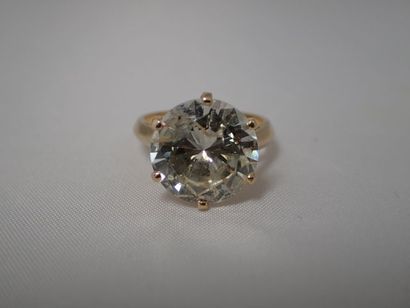 Bague solitaire en or jaune (750 millièmes)...