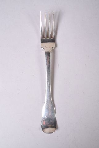 Une fourchette en argent, modèle uniplat,...