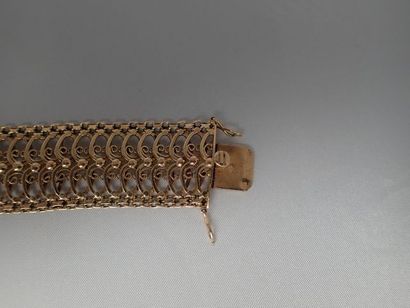 Bracelet à mailles articulées en or jaune...