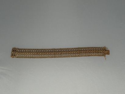 Bracelet à mailles articulées en or jaune...