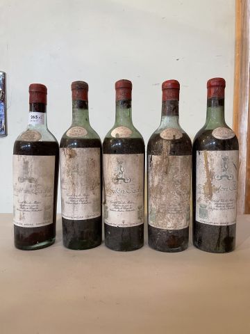 5 bouteilles Mouton Cadet 1943 vendus en...