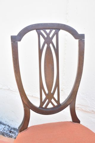 Paire de chaises volantes en acajou et incrustations...