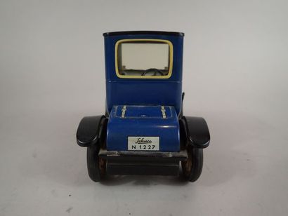 SCHUCO. Ford 1917 en tôle lithographiée bleue....