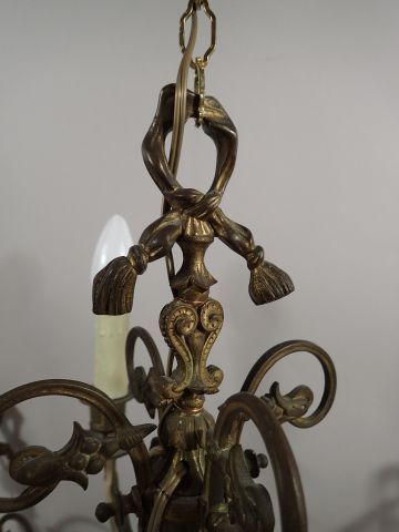 Ensemble de trois lustres à 4 bras de lumière...