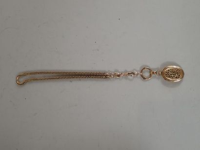 Médaillon souvenir en or jaune 18K chiffré...