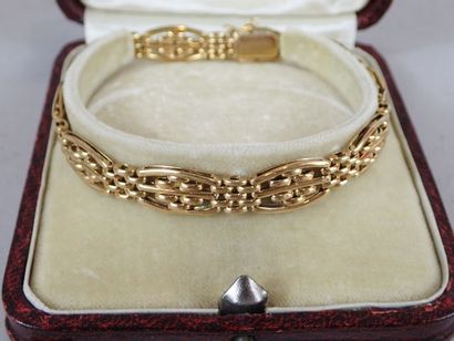 Bracelet articulé en or jaune.

Poids : 16...