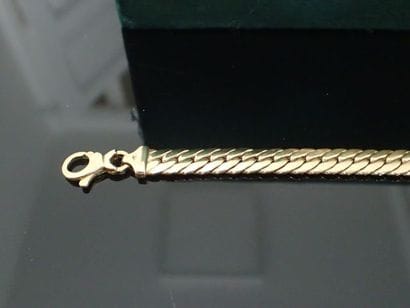 Bracelet à maille en or jaune 18K. Poids...