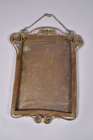 Cadre rectangulaire en bronze doré à décor...