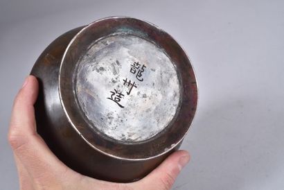 Japon, vers 1900

Vase en bronze de patine...