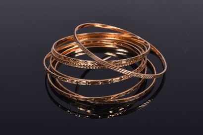 7 bracelets dit “ semainier” en or jaune...