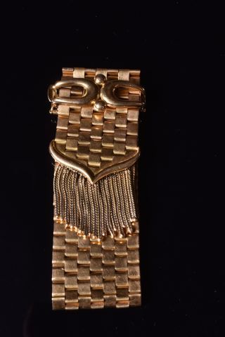 Large bracelet dit “ ceinture” en or jaune...