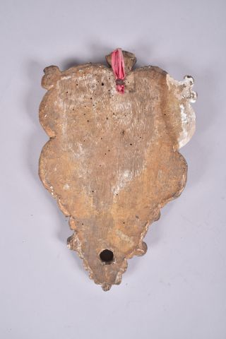 Elément d'applique en bois sculpté et doré,...
