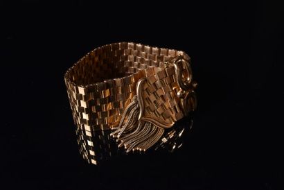 Large bracelet dit “ ceinture” en or jaune...