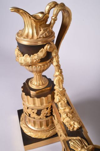 M. SAUTEL. Paire de feux en bronze ciselé...