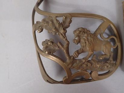 Lot : Deux chappes d’épée en laiton doré...