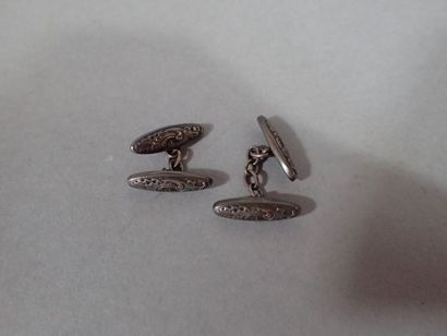 Paire de boutons de manchettes en argent...