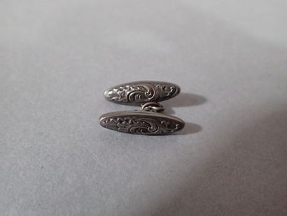 Paire de boutons de manchettes en argent...