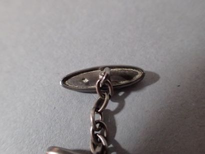 Paire de boutons de manchettes en argent...