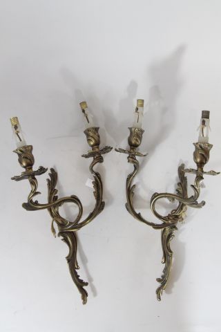 Paire d’appliques en bronze ciselé et doré,...