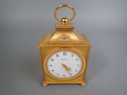 HOUR LAVIGNE. Pendule Borne en bronze doré...