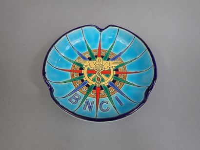 LONGWY. Cendrier B.N.C.I. en faïence polychrome...