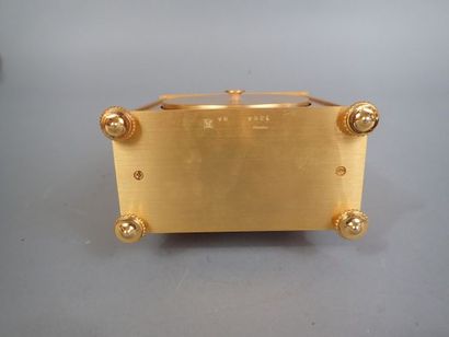 HOUR LAVIGNE. Pendule Borne en bronze doré...