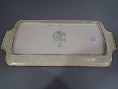 LONGWY. Plat à cake en faïence polychrome...