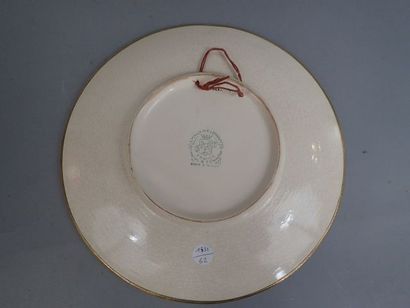 LONGWY. Grand plat rond en faïence polychrome...