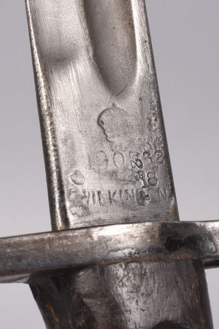 GB. Baïonnette modèle 1907, poignée à plaquette...