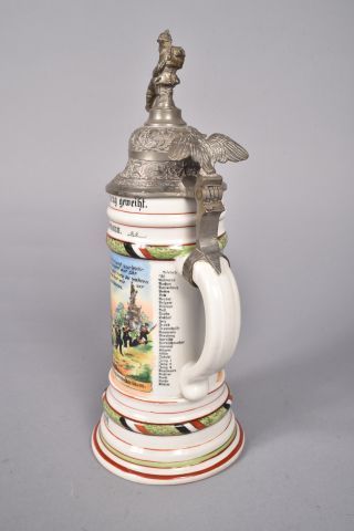 Chope du réserviste Metz, en porcelaine polychrome,...