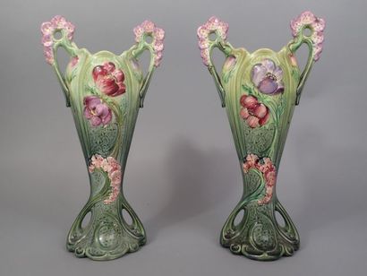 Paire de grands vases en barbotine à décor...
