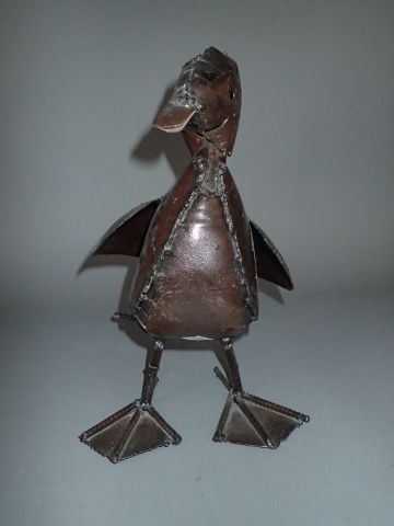 Canard en tôle laqué brune. Travail artisanal...