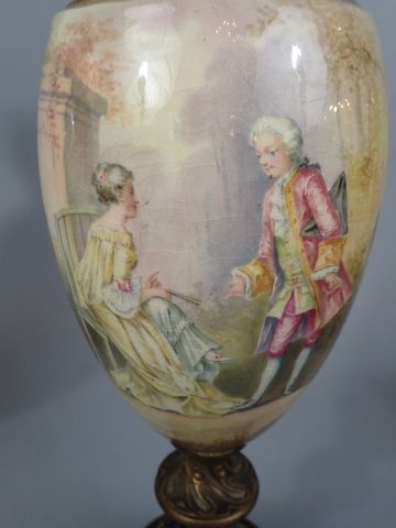 SEVRES, dans le goût de. Paire de vases couverts...