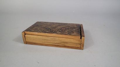 Jeu de dominos en bois noirci à décor d'un...