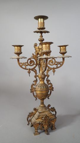 Garniture de cheminée composée d'une pendule...