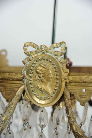 Plafonnier en bronze, ogive de cristal centrale...