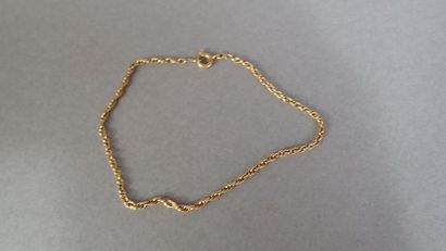 Bracelet en or jaune poinçonné tête d'aigle....